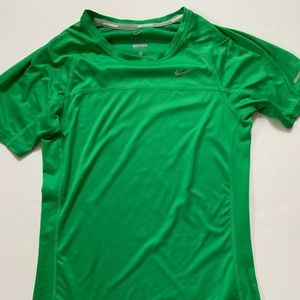 green woman nike running short sleeve shirt